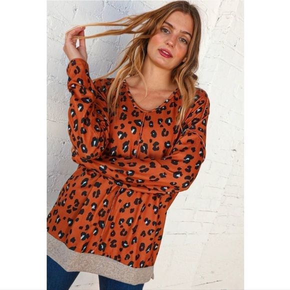 Rust V-Neck Animal Print Out Seam Style Top - Picture 1 of 4